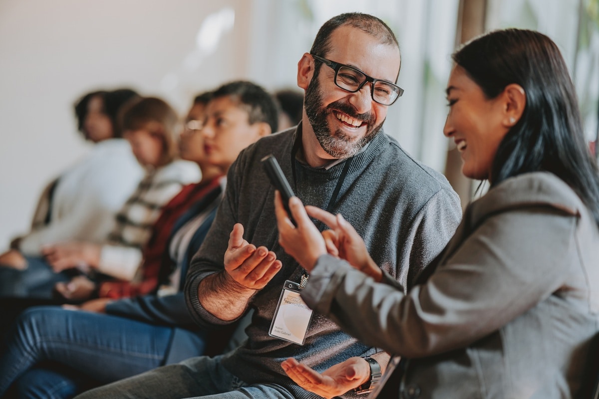 A man and a woman laughing together