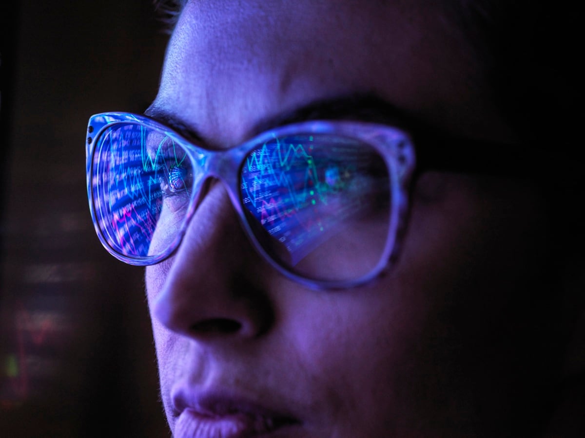 Ladies face with image reflecting in her glasses