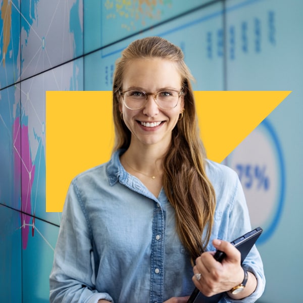 woman in chambray shirt smiling
