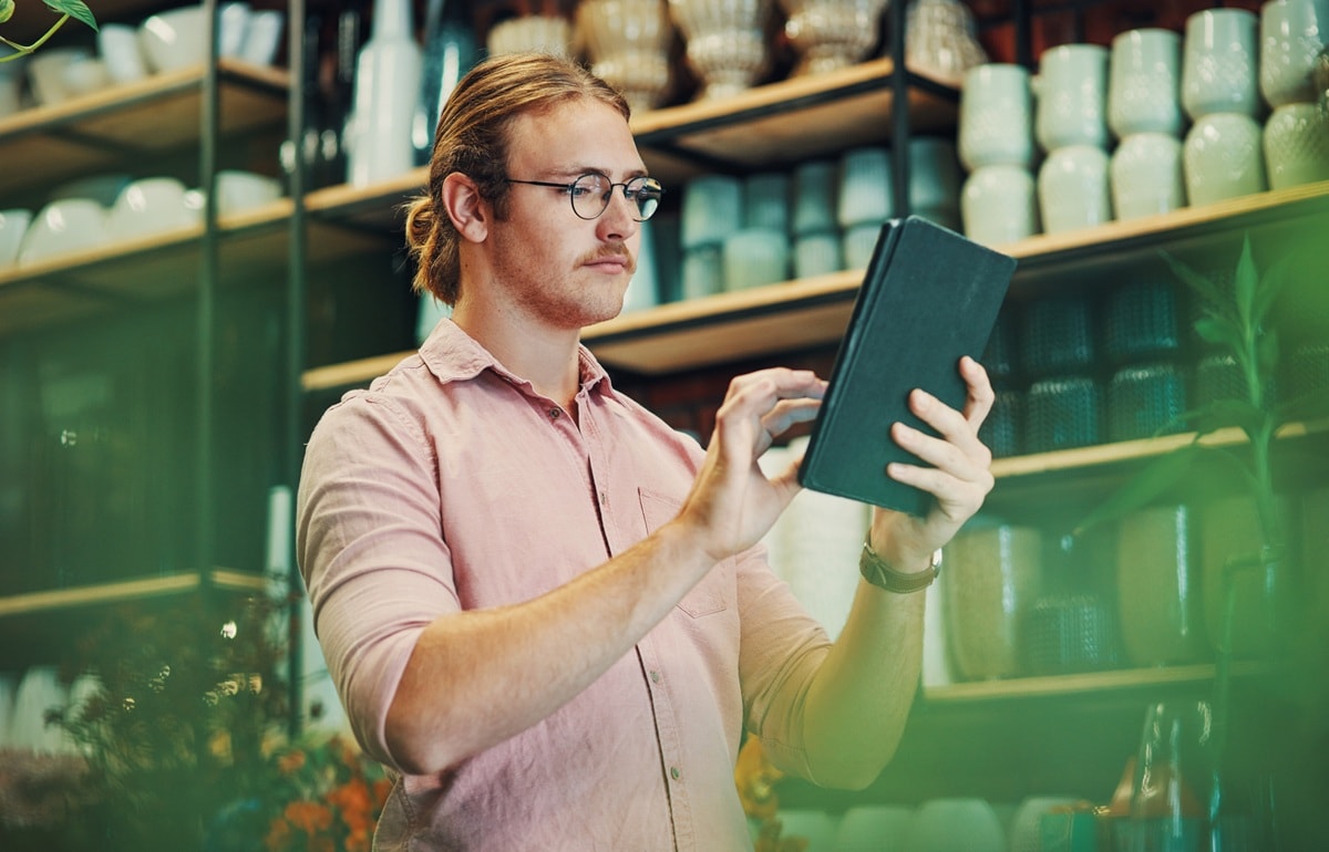 Man looking at tablet