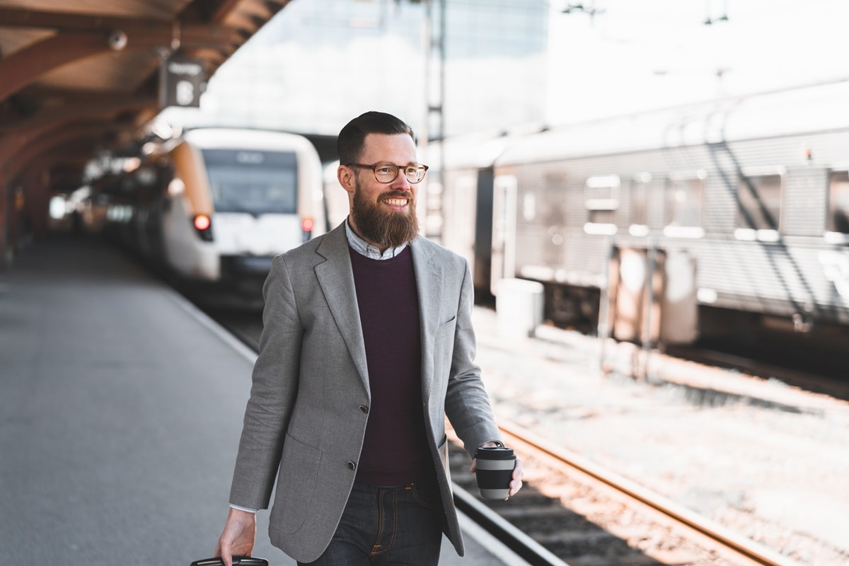 Man walking on train platform
