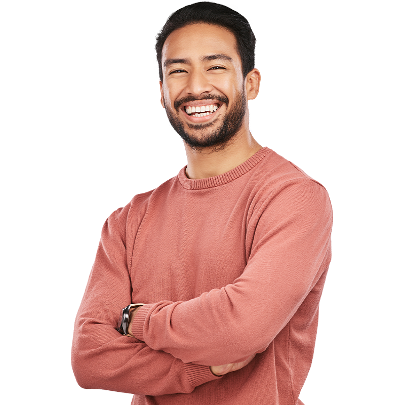 person smiling with arms crossed
