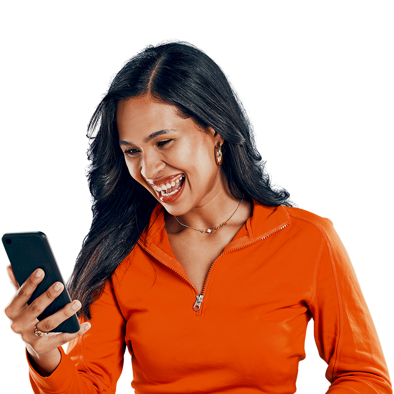woman smiling at phone