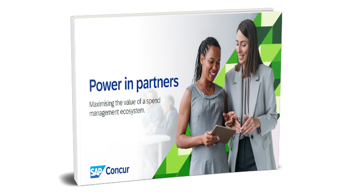 Two ladies dressed smartly looking at a tablet