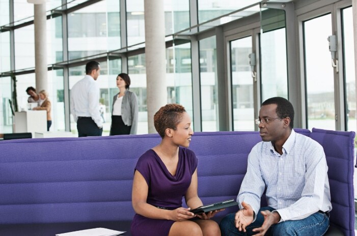 two co-workers sitting 