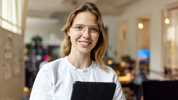 business professional holding tablet device