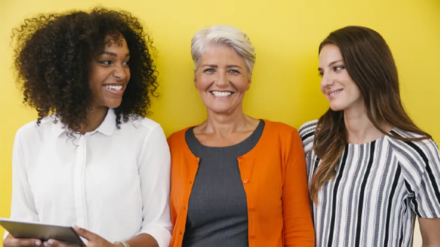 three women smiling