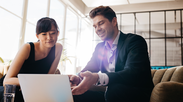 two happy workers in a meeting