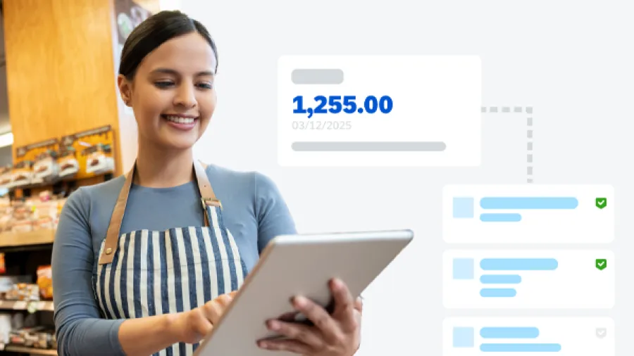 woman using tablet and expense app in store
