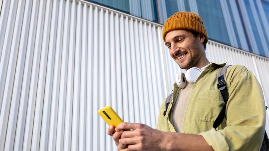 business professional looking at mobile phone