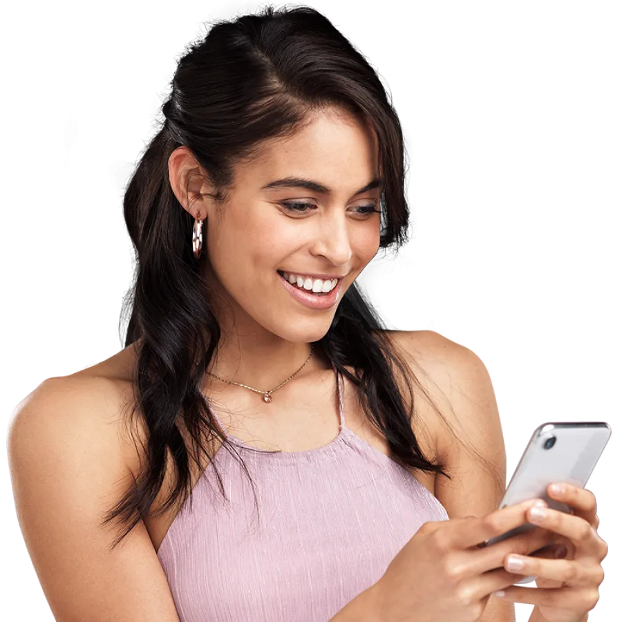 woman holding phone and smiling