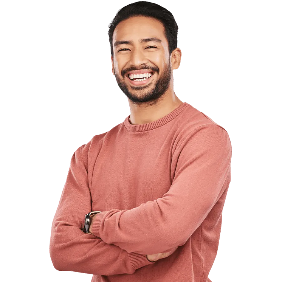 Man smiling with arms crossed
