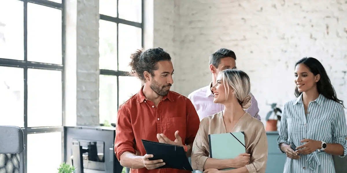 Team smiling and looking happy 
